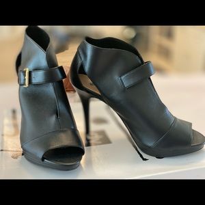 Black leather like material  5in ankle booties